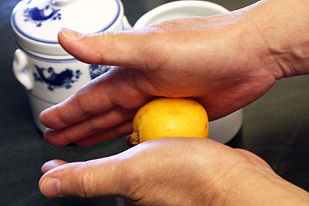 Squeeze and roll loquat before peeling